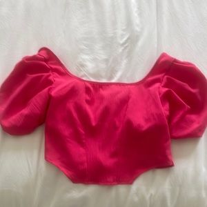cropped pink top with a tie in the back size small